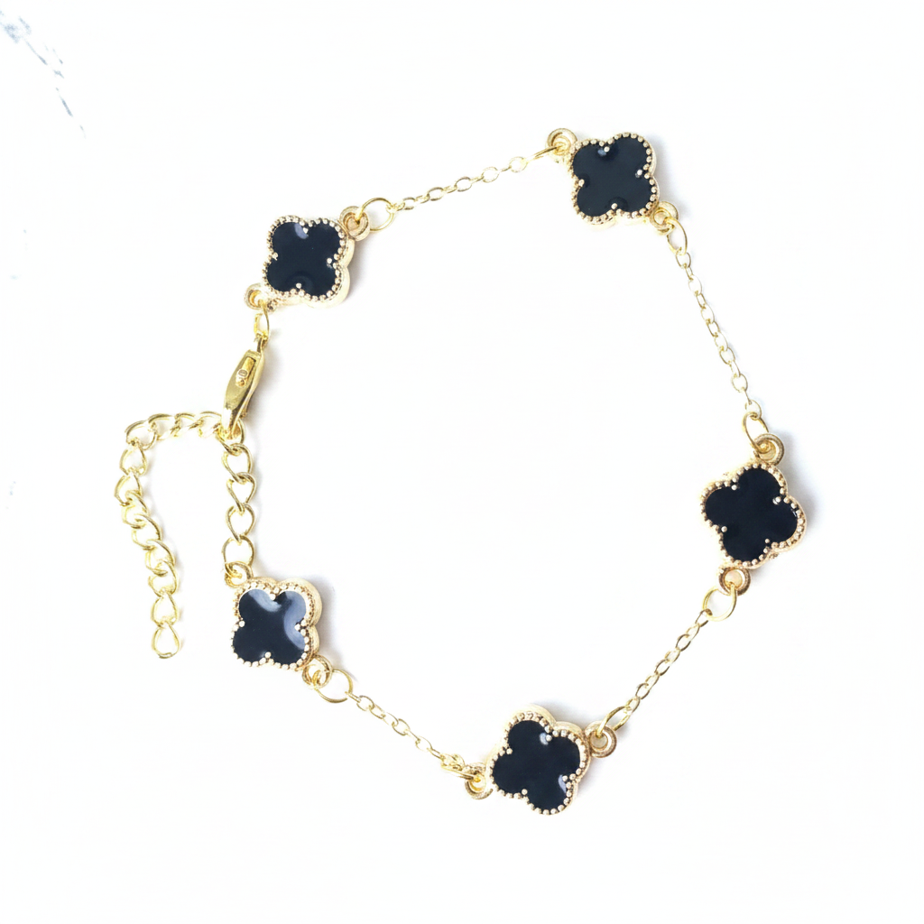Bracelet trèfles fond blanc lumineux